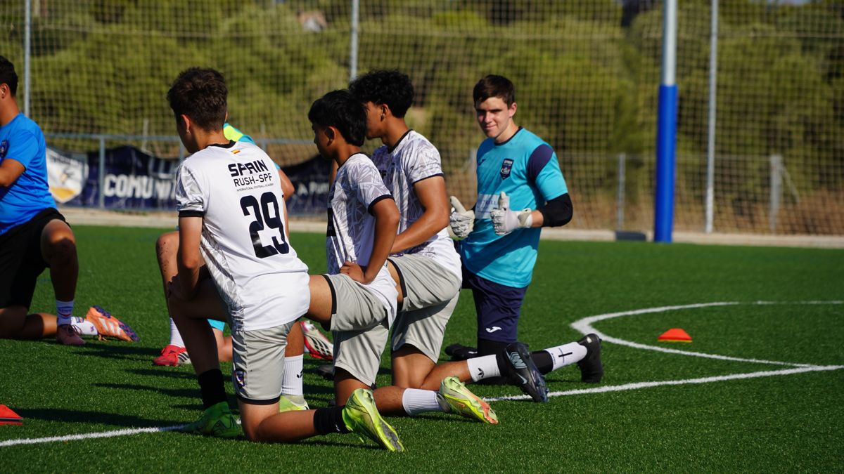 Players stretching at a training session
